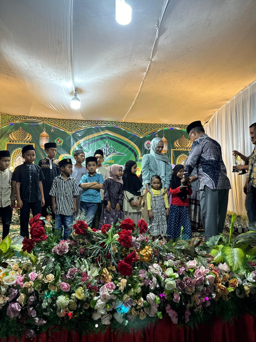 MTQ adalah lomba membaca Al-Qur&rsquo;an untuk meningkatkan keimanan dan kebersamaan masyarakat.
